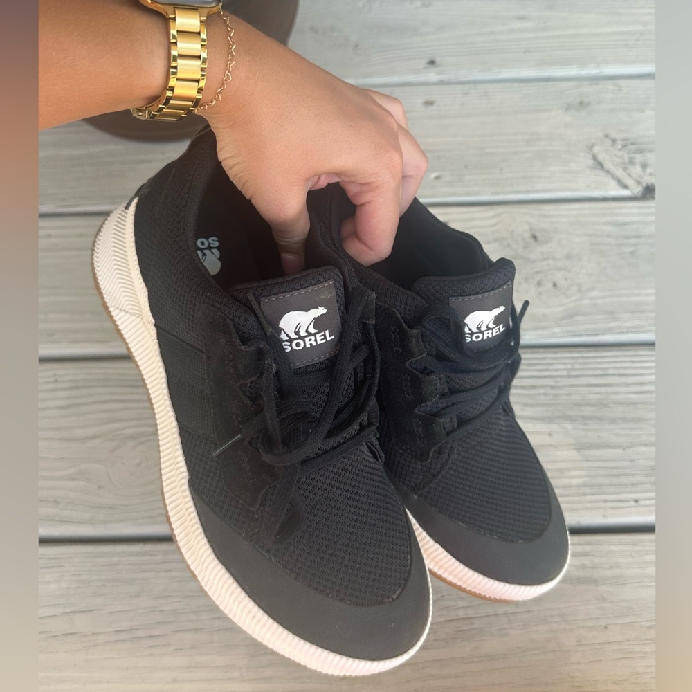 black sorel sneakers